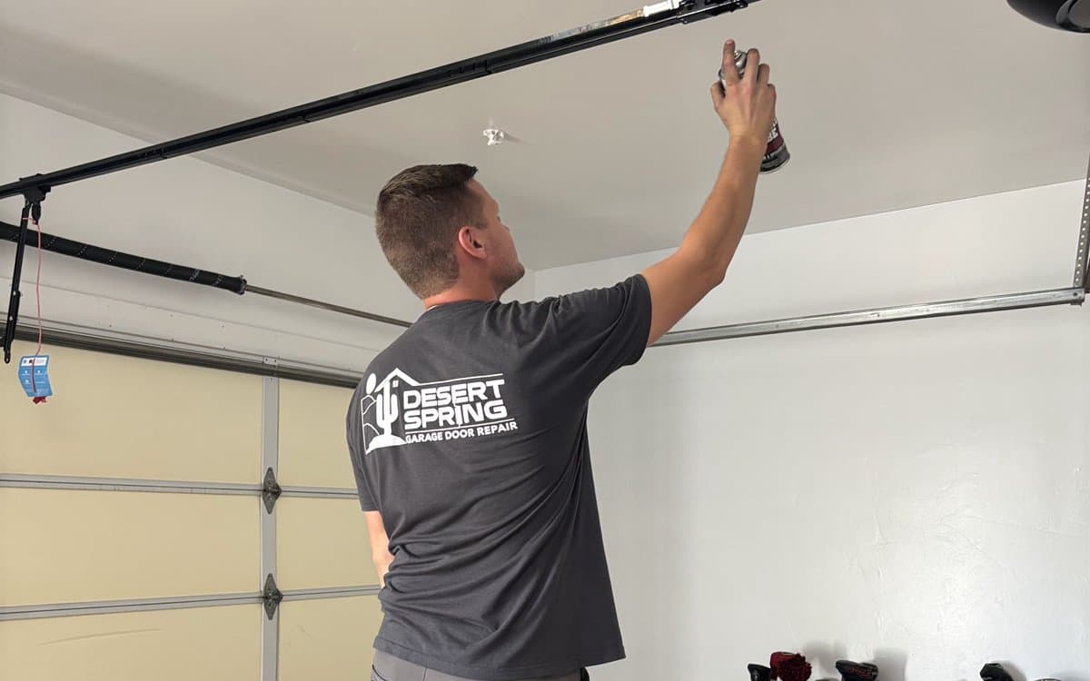 Garage Door Maintenance Apache Junction Desert Spring technician performing a garage door tune-up in Apache Junction, AZ