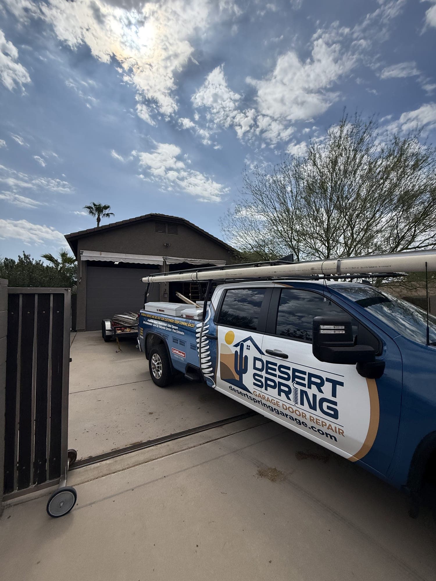 Garage Door Repair Laveen Desert Spring Garage Door Repair truck at a Laveen, AZ home