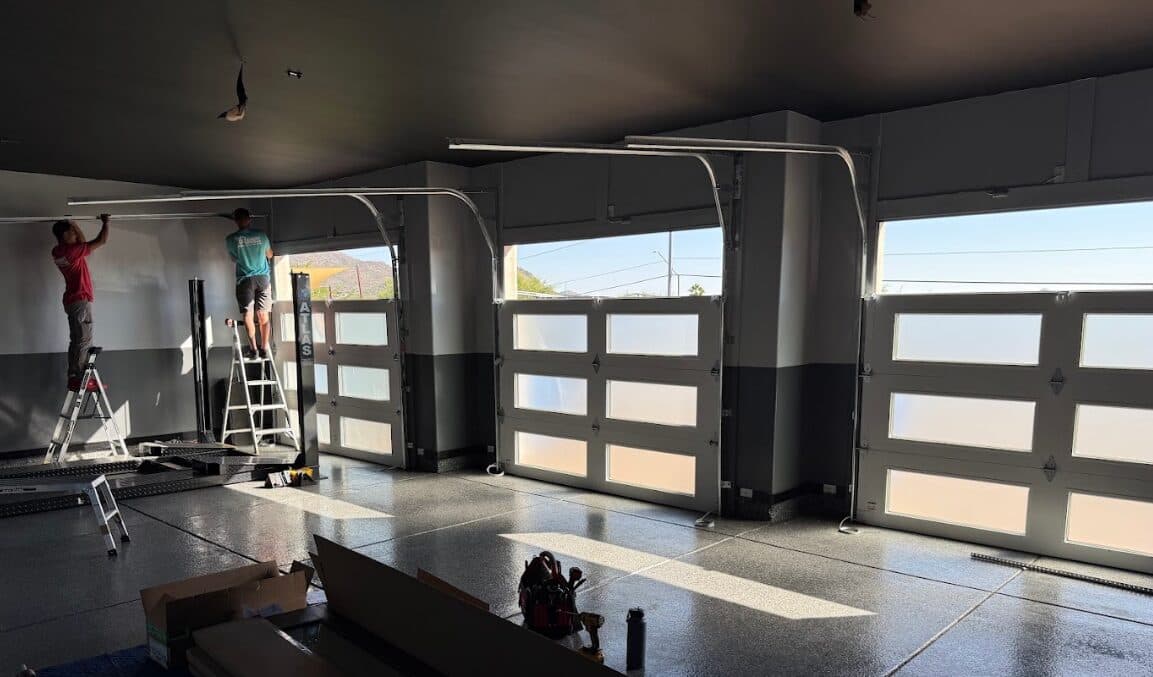 Newly installed modern glass-and-wood garage doors