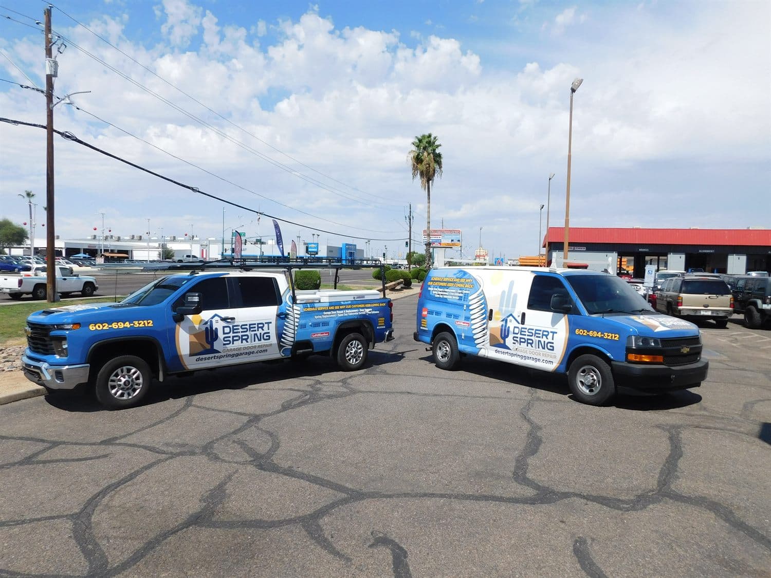 Branded Desert Spring Garage Door Repair service trucks ready for dispatch